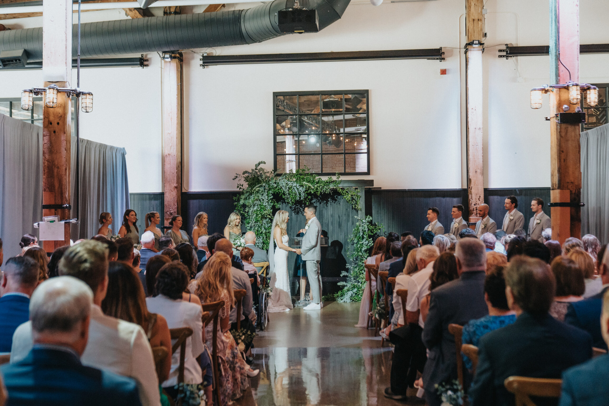 A7408612 The venue's large windows let in tons of natural light, which can make all the difference for those romantic, soft-lit shots. The golden hour, when the sun begins to set, creates an enchanting ambiance that enhances your wedding photos.